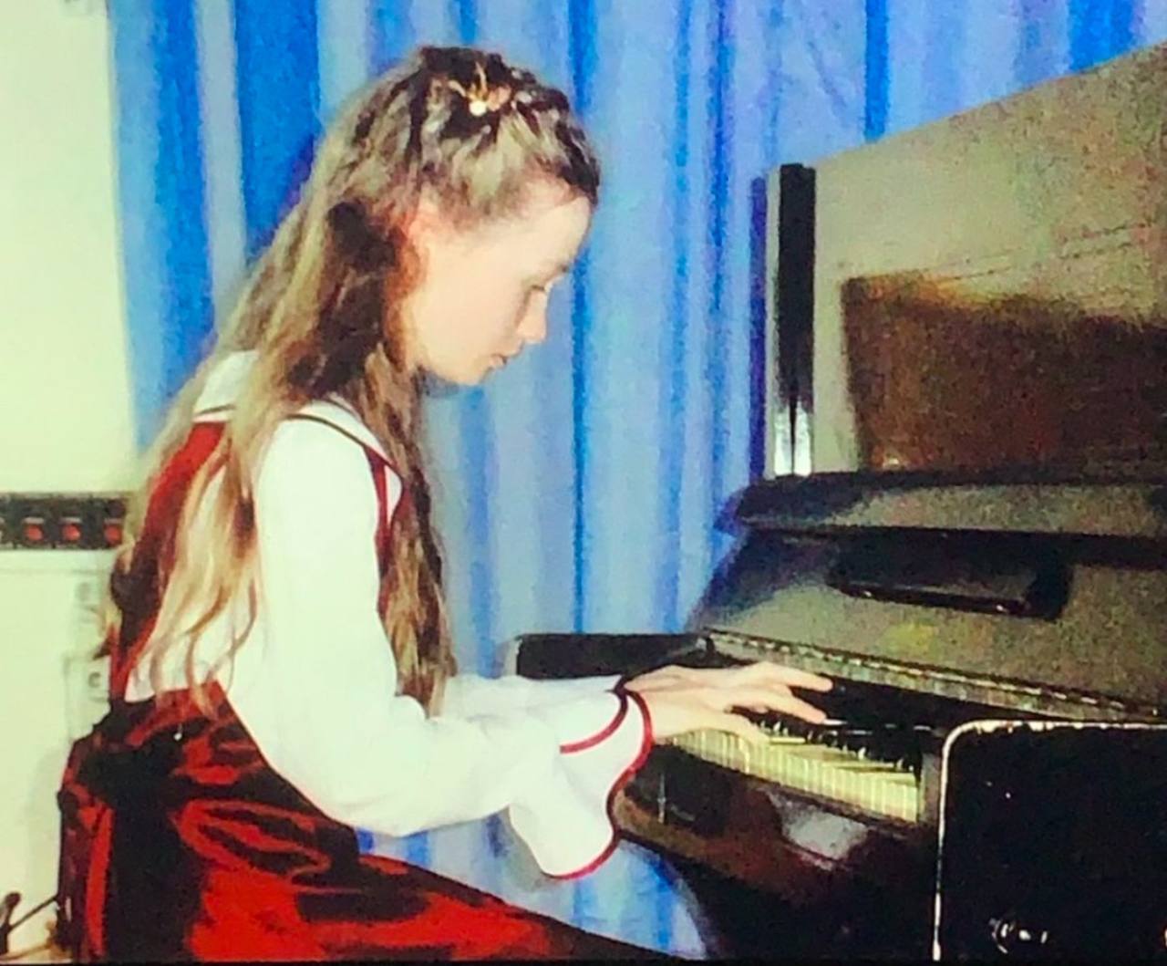 Liana during an early piano performance